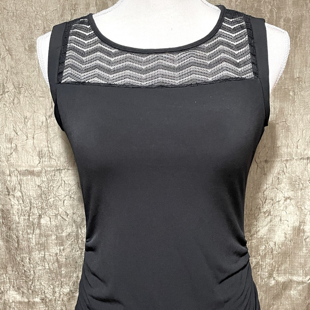 Black shirt with lace detail. New York & Company.